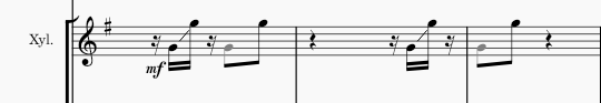 A staff with three bars of a Xylophone score. The score is in G major and some semi quavers are joined with a line at a 45 degree angle. This is a slide symbol, which means the beater is slid over the keys of the xylophone between the two notes.